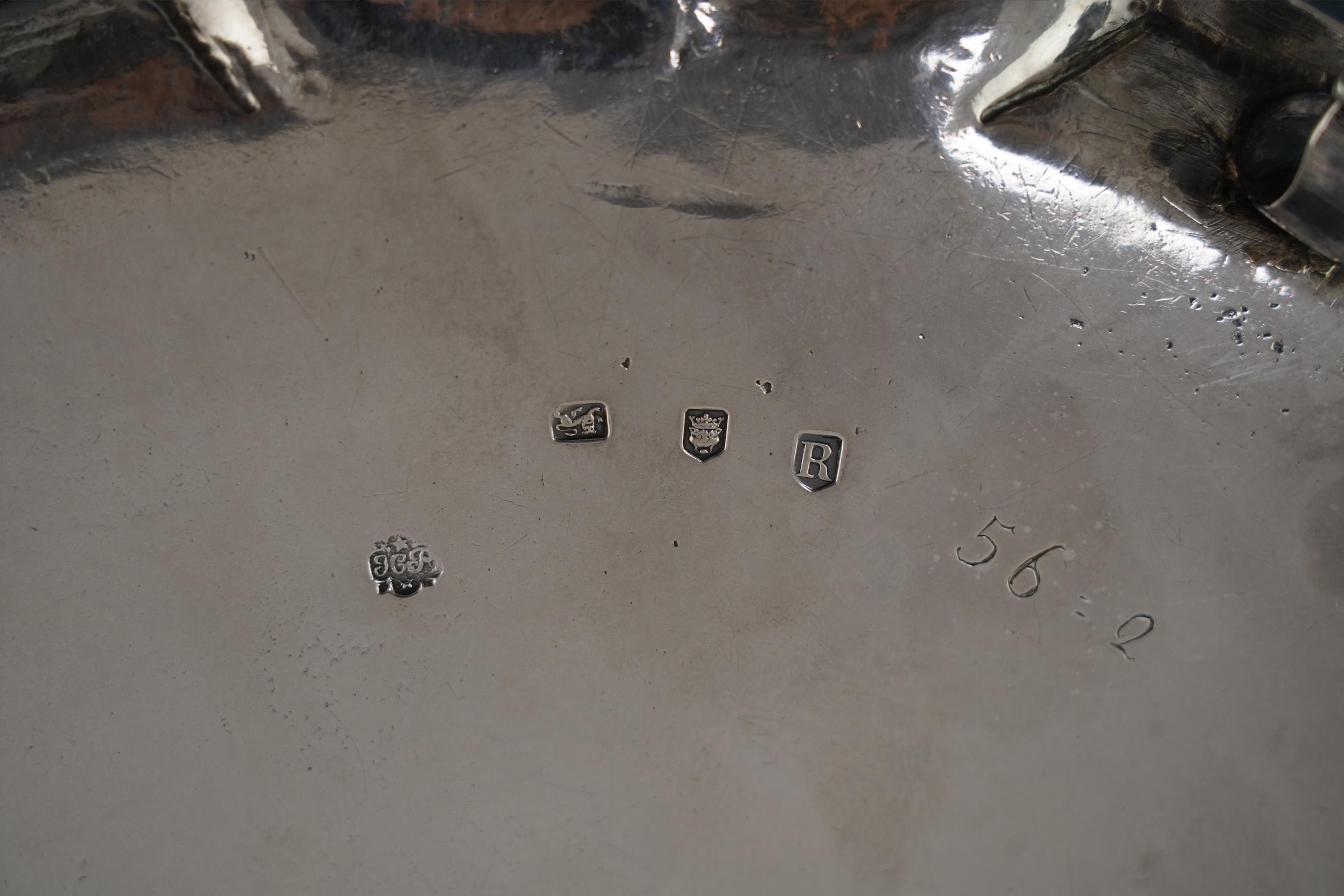 A large early George II silver salver, by Humphrey Payne, engraved with the Lowth and Tregonwell family crests